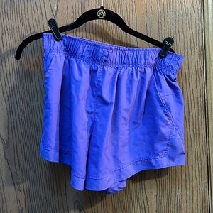 Purple athletic running shorts with built in liner